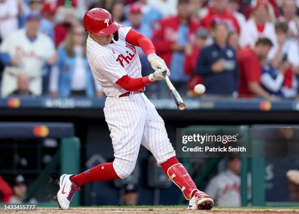 Rhys Hoskins of the Philadelphia Phillies hits a three run home run against Spencer Strider of the Atlanta Braves during the third inning in game...