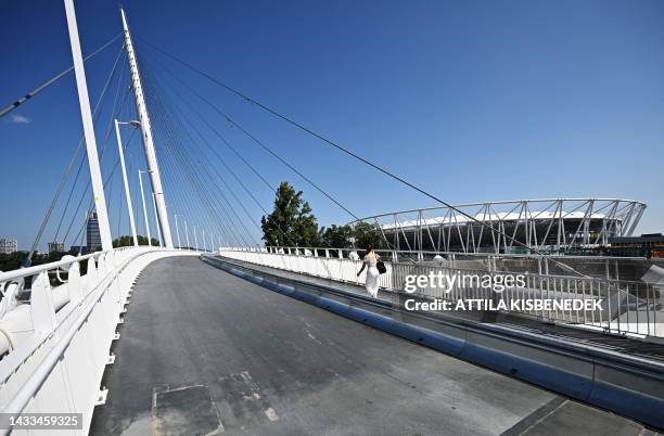 Local woman walks on the bridge of the new athletic stadium of Budapest, Hungary, on July 03, 2023. The stadium is the venue of the next World...