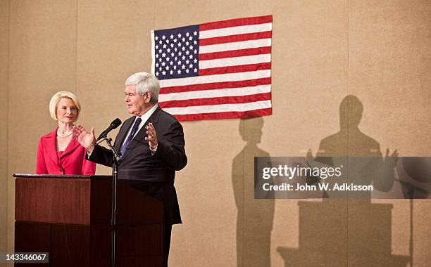 Republican presidential candidate, former Speaker of the House Newt Gingrich speaks during a primary night gathering with his wife, Callista...
