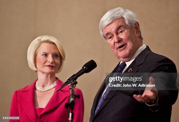 Republican presidential candidate, former Speaker of the House Newt Gingrich speaks during a primary night gathering with his wife, Callista...