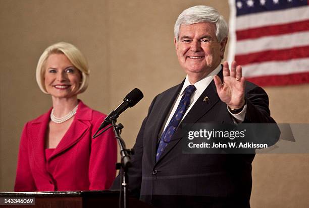 Republican presidential candidate, former Speaker of the House Newt Gingrich speaks during a primary night gathering with his wife, Callista...