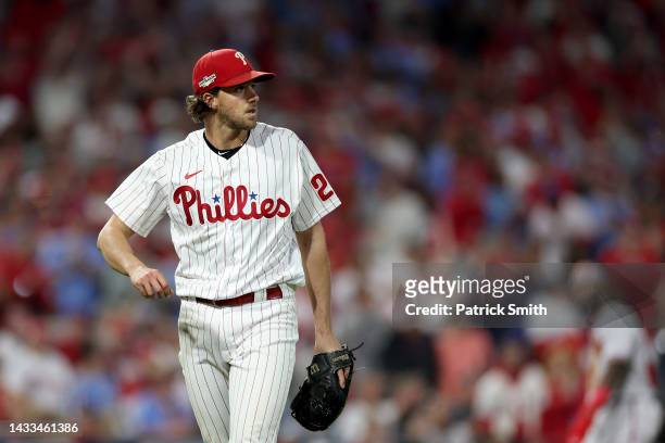 Aaron Nola of the Philadelphia Phillies walks back to the dugout after closing out the top of the sixth inning against the Atlanta Braves in game...