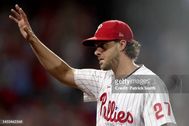 Aaron Nola of the Philadelphia Phillies waves to the crowd after being relieved during the seventh inning against the Atlanta Braves in game three of...