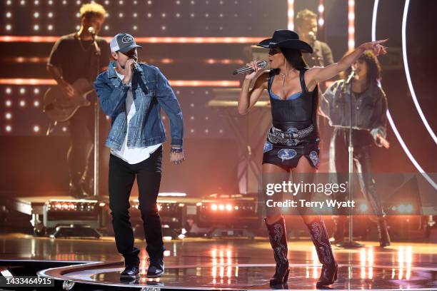 In this photo released on October 14 Walker Hayes and Ciara perform onstage during 2022 CMT Artists of the Year at Schermerhorn Symphony Center on...