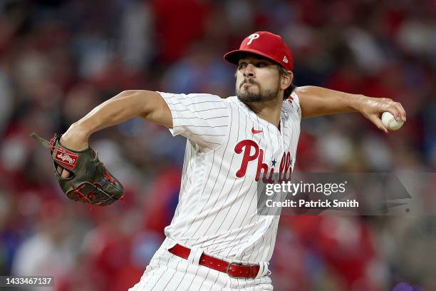 Brad Hand of the Philadelphia Phillies throws a pitch against the Atlanta Braves during the eighth inning in game three of the National League...