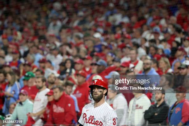 Bryce Harper of the Philadelphia Phillies looks on against the Atlanta Braves during the seventh inning in game three of the National League Division...