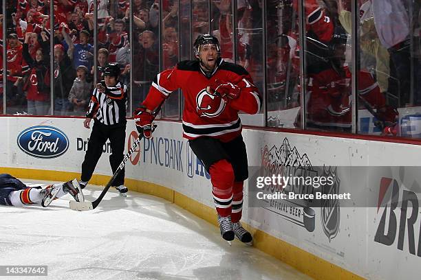 Travis Zajac of the New Jersey Devils celebrates after he scored the game-winning goal in overtime against the Florida Panthers in Game Six of the...