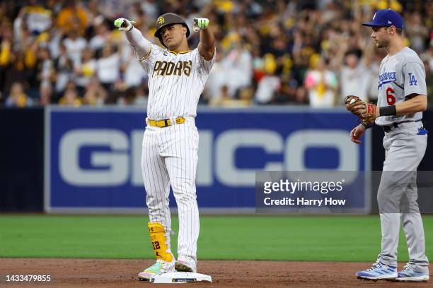 Juan Soto of the San Diego Padres reacts after hitting a double against the Los Angeles Dodgers during the first inning in game three of the National...