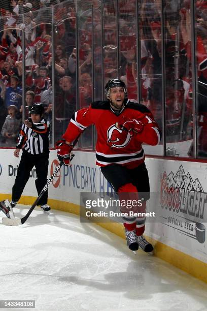 Travis Zajac of the New Jersey Devils celebrates after he scored the game-winning goal in overtime against the Florida Panthers in Game Six of the...