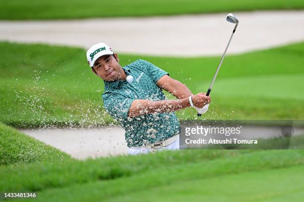 Hideki Matsuyama of Japan hits out from a bunker on the 11th hole during the third round of the ZOZO Championship at Accordia Golf Narashino Country...