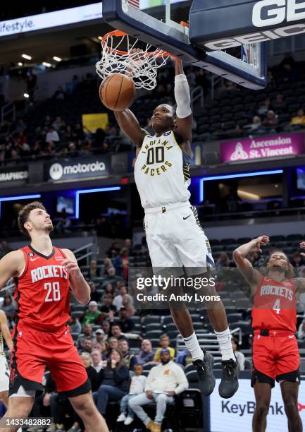 Bennedict Mathurin of the Indiana Pacers shoots the ball against the Houston Rockets during the game at Gainbridge Fieldhouse on October 14, 2022 in...