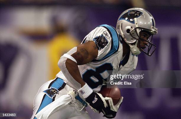 Wide receiver Steve Smith of the Carolina Panthers carries the ball against the Minnesota Vikings during the game on September 22, 2002 at the Hubert...