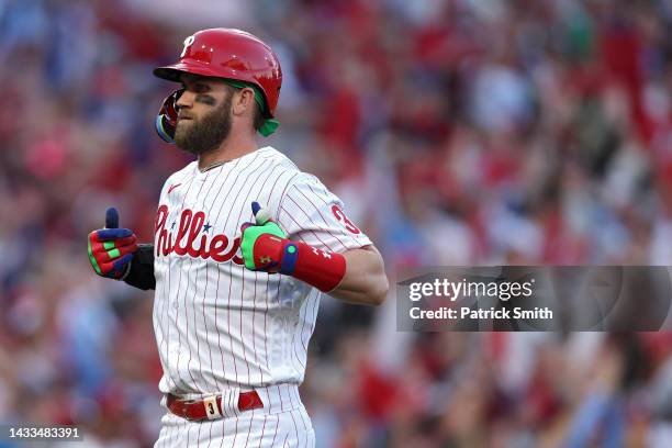 Bryce Harper of the Philadelphia Phillies celebrates after hitting a two run home run against the Atlanta Braves during the third inning in game...