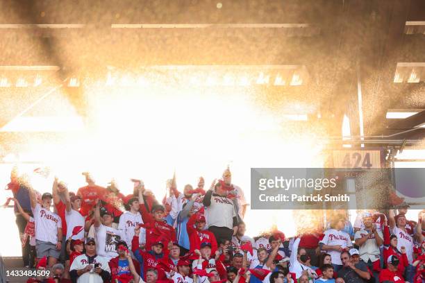 Fans cheer before the Atlanta Braves play against the Philadelphia Phillies in game three of the National League Division Series at Citizens Bank...