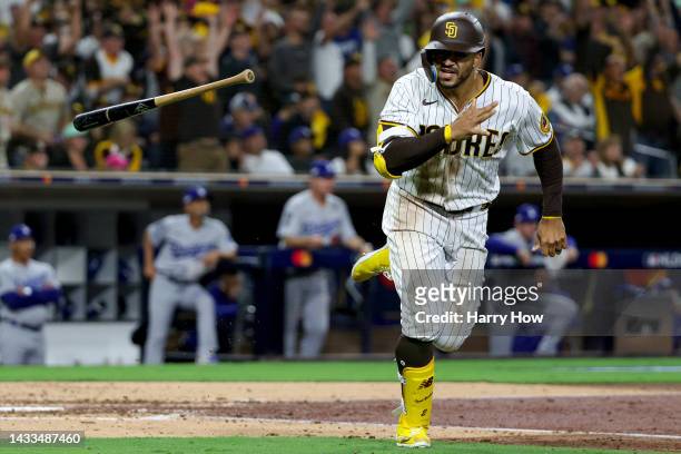 Trent Grisham of the San Diego Padres reacts after hitting a home run against the Los Angeles Dodgers during the fourth inning in game three of the...