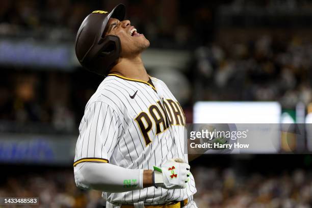Trent Grisham of the San Diego Padres reacts after hitting a home run against the Los Angeles Dodgers during the fourth inning in game three of the...