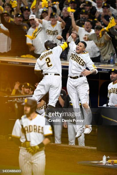 Trent Grisham of the San Diego Padres celebrates after hitting a home run against the Los Angeles Dodgers during the fourth inning in game three of...