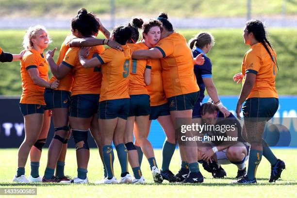 Australia celebrate on full time during the Pool A Rugby World Cup 2021 match between Scotland and Australia at Northland Events Centre on October 15...