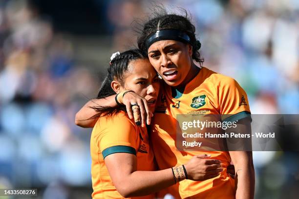 Trilleen Pomare and Sera Naiqama of Australia celebrate victory during the Pool A Rugby World Cup 2021 match between Scotland and Australia at...