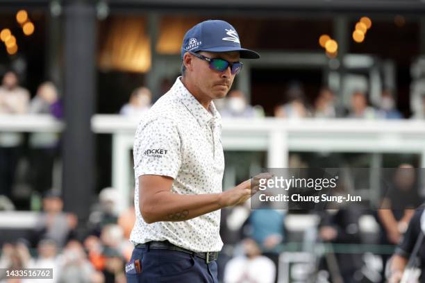 Rickie Fowler of the United States acknowledges the gallery after holing out with the birdie on the 18th green during the third round of the ZOZO...