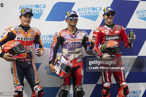 Marc Marquez of Spain and Repsol Honda Team, Jorge Martin of Spain and Pramac Racing and Francesco Bagnaia of Italy and Ducati Lenovo Team pose at...