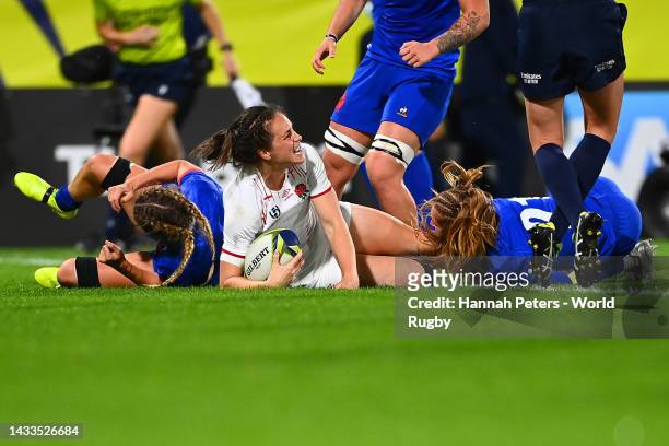 Emily Scarratt of England celebrates scoring a try during the Pool C Rugby World Cup 2021 match between France and England at Northland Events Centre...