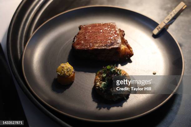 Atmosphere at a dinner hosted by Alain Ducasse and Alberto Marcolongo during the 2022 New York City Wine & Food Festival presented by Capital One at...