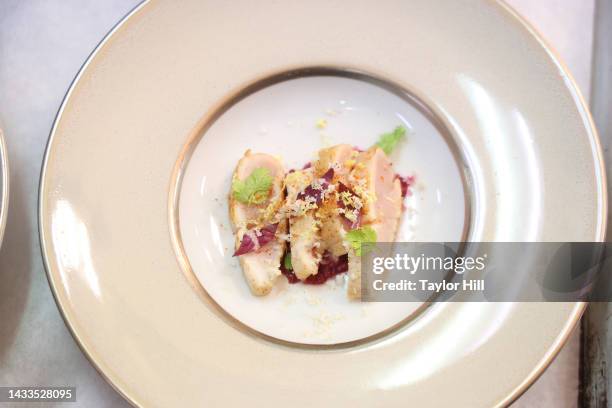 Atmosphere at a dinner hosted by Alain Ducasse and Alberto Marcolongo during the 2022 New York City Wine & Food Festival presented by Capital One at...