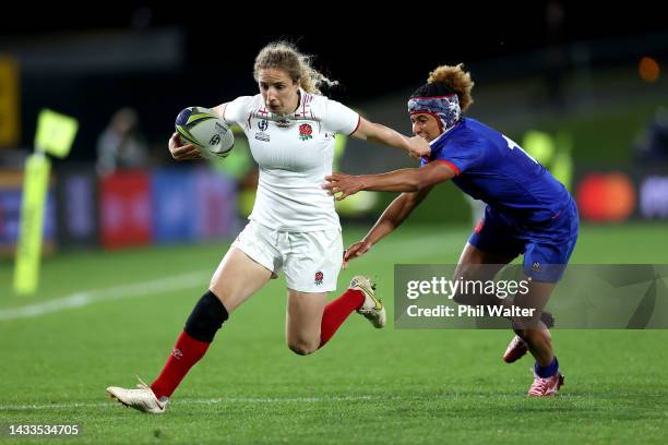 Abby Dow of England is tackled during the Pool C Rugby World Cup 2021 match between France and England at Northland Events Centre on October 15 in...