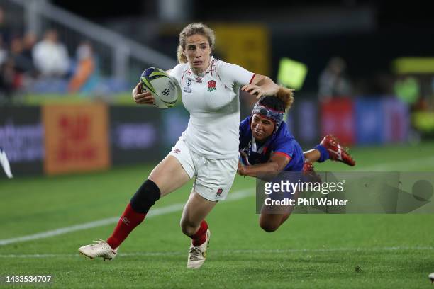 Abby Dow of England is tackled during the Pool C Rugby World Cup 2021 match between France and England at Northland Events Centre on October 15 in...