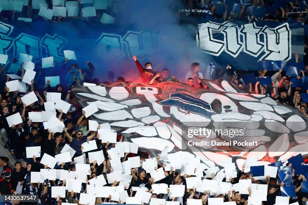 Flare is seen in the crowd as fans show their support during the round two A-League Men's match between Melbourne Victory and Western Sydney...