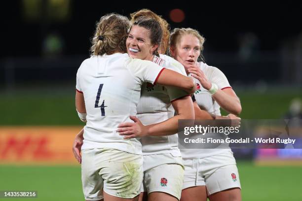 Abbie Ward and Zoe Aldcroft of England celebrate victory during the Pool C Rugby World Cup 2021 match between France and England at Northland Events...