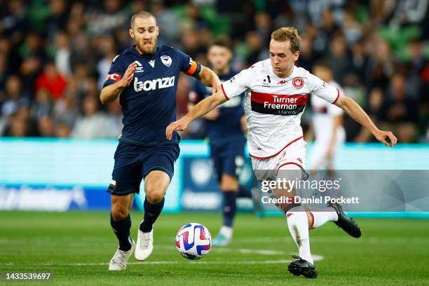 Calem Nieuwenhof of the Wanderers and Joshua Brillante of the Victory contest the ball during the round two A-League Men's match between Melbourne...