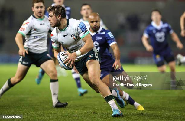 Ollie Hassell-Collins of London Irish runs with the ball during the Gallagher Premiership Rugby match between Sale Sharks and London Irish at Salford...