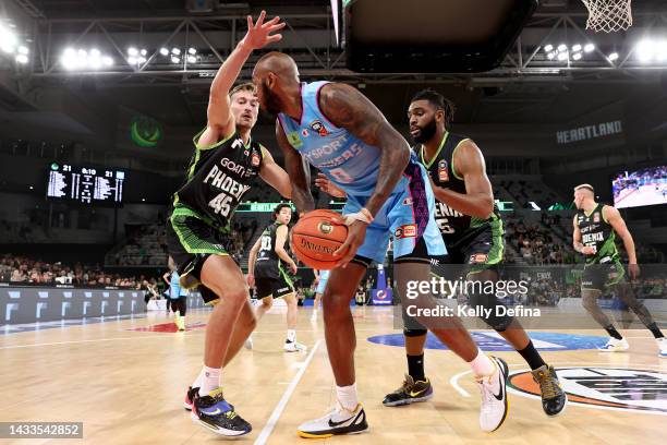 Ryan Broekhoff of the Phoenix guards Dererk Pardon of the Breakers during the round three NBL match between South East Melbourne Phoenix and New...