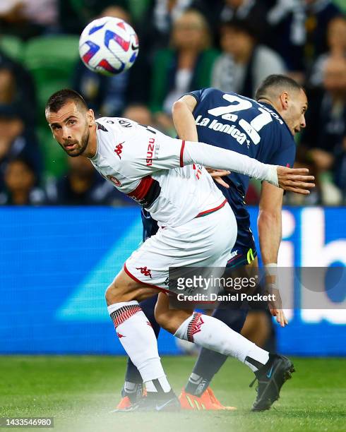 Sulejman Krpic of the Wanderers and Roderick Miranda of the Victory contest the ball during the round two A-League Men's match between Melbourne...