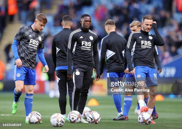 Harvey Barnes, Patson Daka and James Maddison of Leicester City warm up prior tog the Premier League match between Leicester City and Crystal Palace...