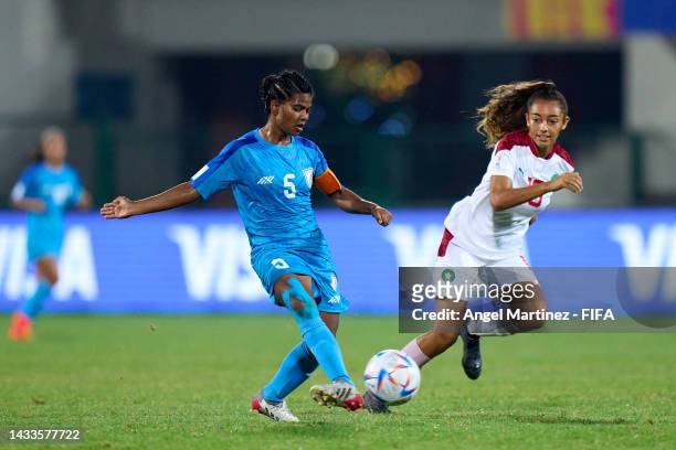 Astam Oraon of India is challenged by Ambre Basser of Morocco during the FIFA U-17 Women's World Cup 2022 Group A match between India and Morocco at...