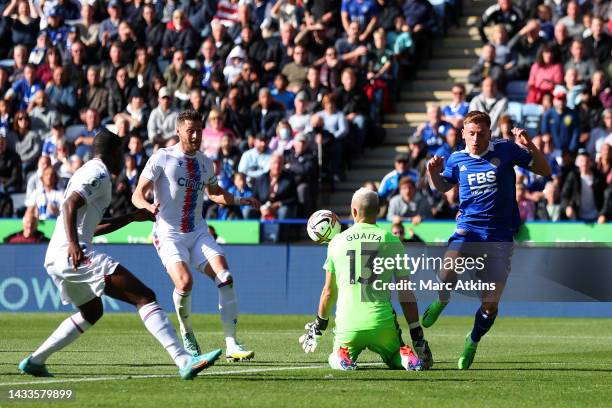 Vicente Guaita of Crystal Palace makes a save from Harvey Barnes of Leicester City during the Premier League match between Leicester City and Crystal...