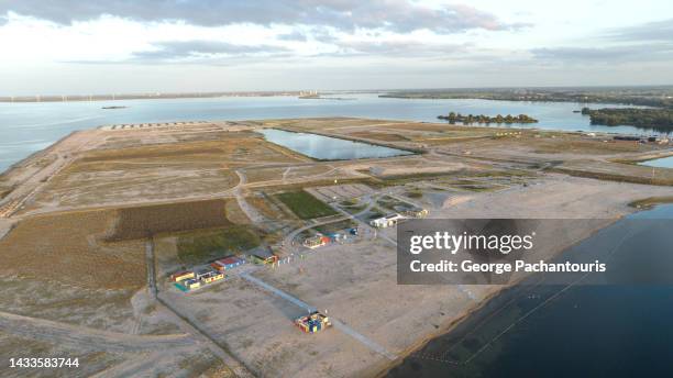 aerial photo of the beach on ijburg artificial island under construction in amsterdam, holland - ijsselmeer stock pictures, royalty-free photos & images