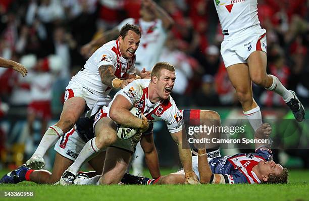 Ben Creagh of the Dragons celebrates scoring a try with team mates during the round eight NRL match between the St George Illawarra Dragons and the...