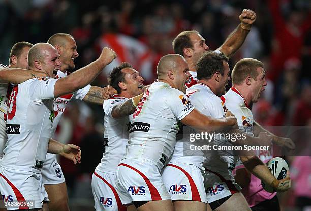 Ben Creagh of the Dragons celebrates scoring a try with team mates during the round eight NRL match between the St George Illawarra Dragons and the...