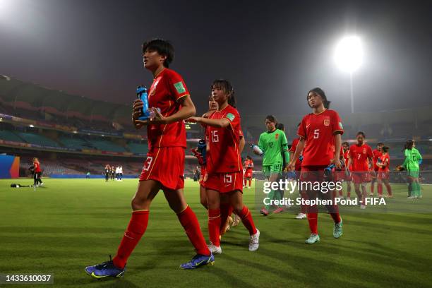 Players of China stand dejected following the FIFA U-17 Women's World Cup 2022 group stage match between China and Colombia at DY Patil Stadium on...