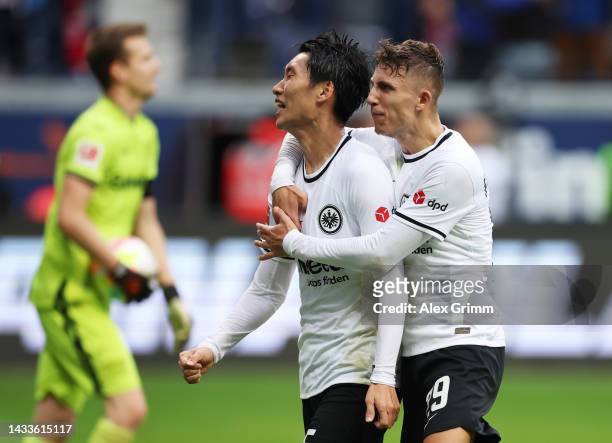 Daichi Kamada of Eintracht Frankfurt celebrates after scoring their team's first goal during the Bundesliga match between Eintracht Frankfurt and...