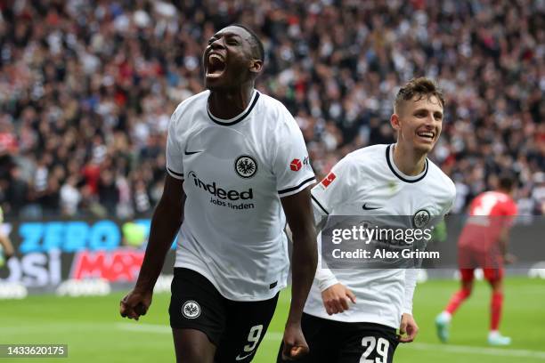 Randal Kolo Muani of Eintracht Frankfurt celebrates after scoring their team's second goal during the Bundesliga match between Eintracht Frankfurt...