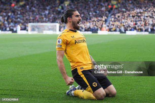 Ruben Neves of Wolverhampton Wanderers celebrates after scoring his sides first goal from the penalty spot during the Premier League match between...