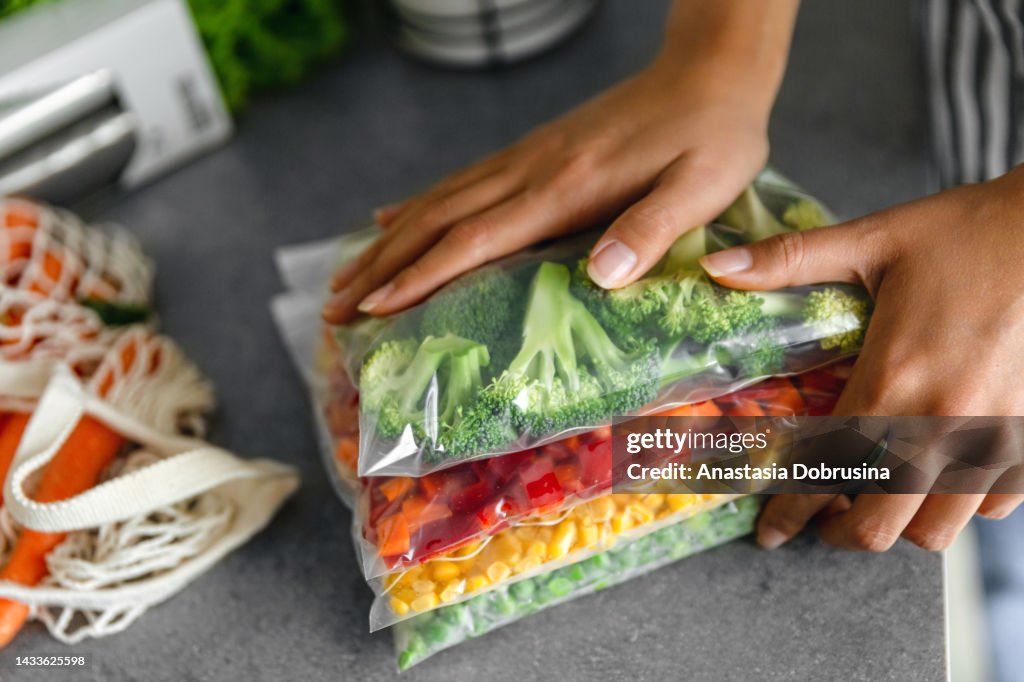 Fresh ripe vegetables in plastic bags