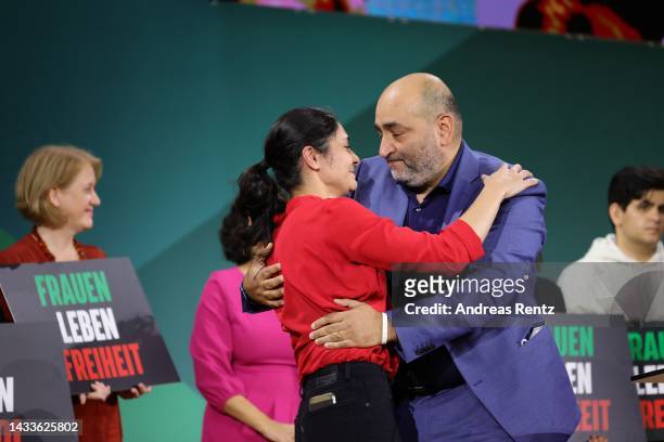 Green party co-chair Omid Nouripour comforts Pegah Ferydoni after her speech to the federal deligates during the German Greens party federal congress...