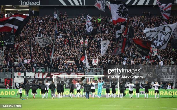 Eintracht Frankfurt players celebrate with the fans after their sides victory during the Bundesliga match between Eintracht Frankfurt and Bayer 04...