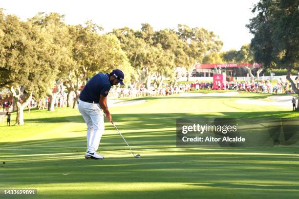 Angel Hidalgo of Spain plays his second shot on the 18th hole on Day Three of the Estrella Damm N.A. Andalucía Masters at Real Club Valderrama on...